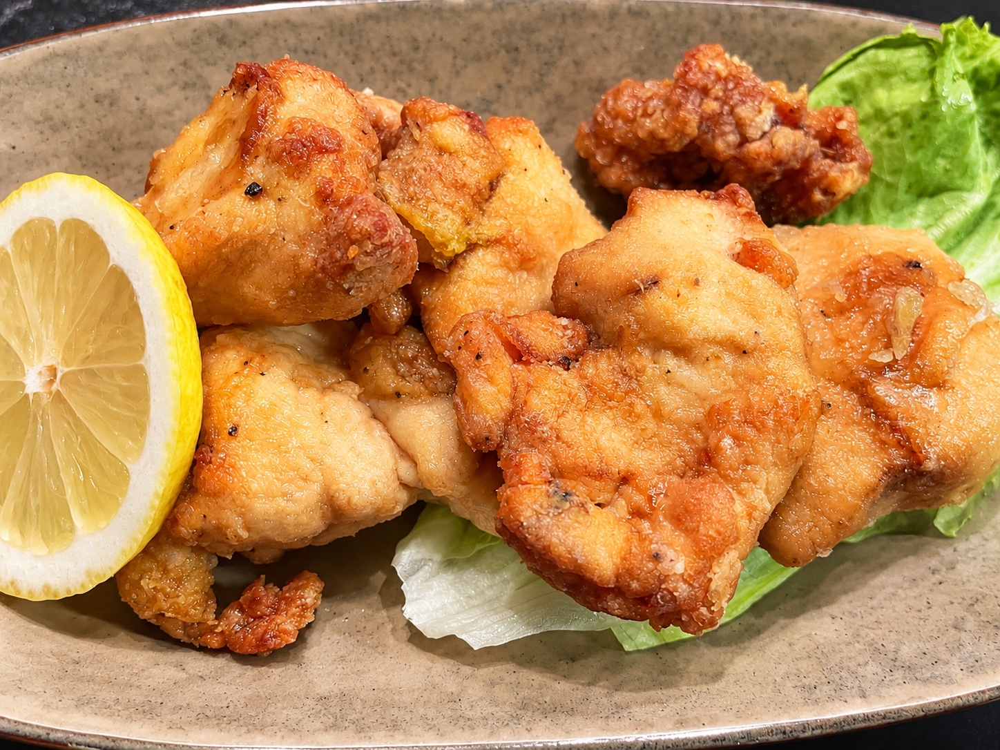 Air fryer karaage with lemon and lettuce