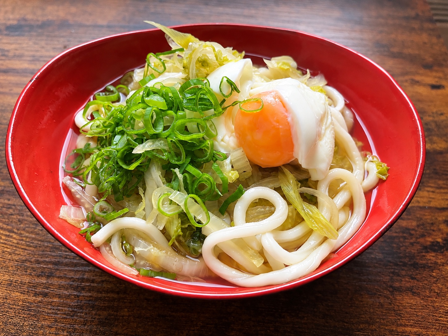 Napa cabbage udon soup with egg and spring onions